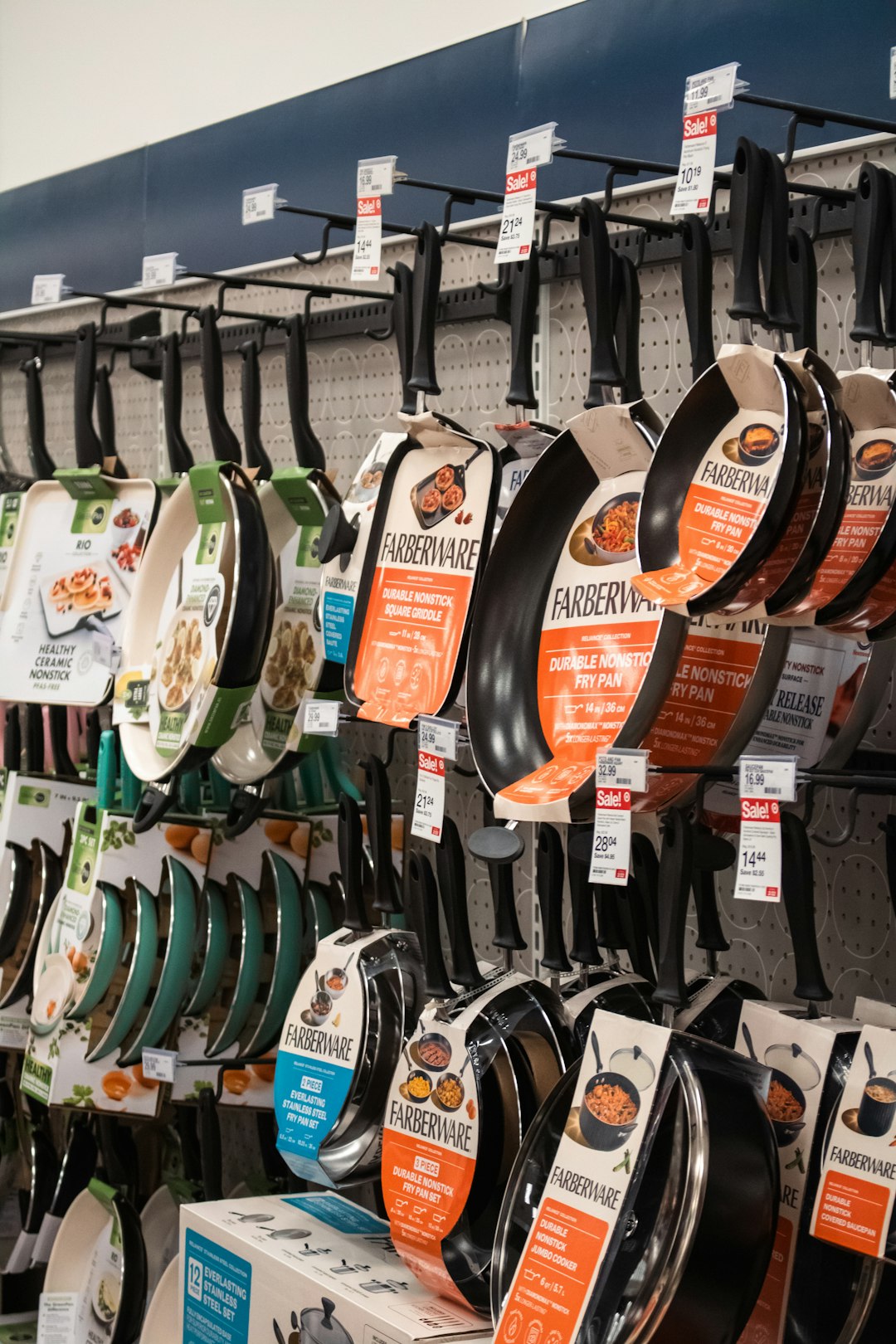 A display of Farberware frying pans and skillets in a Target store. by Vitamin Brands Pans from farberware are displayed at the store.
