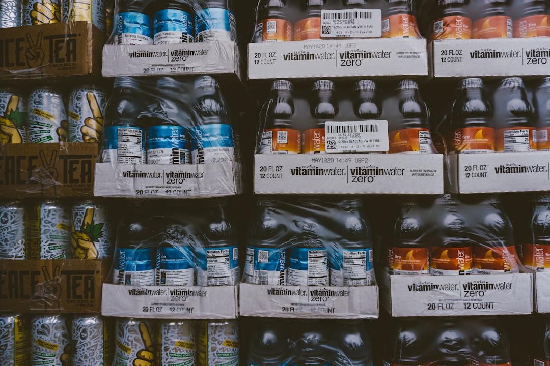 blue and white labeled plastic bottle